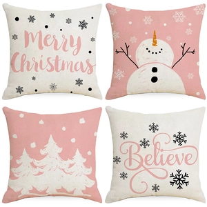 Set of four Christmas pillow covers with snowman prints and Merry Christmas lettering