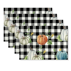Set of 4 waterproof placemats with buffalo check and colorful pumpkin patterns