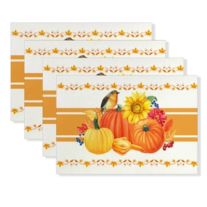 Detail of four rectangular Thanksgiving placemats with pumpkin and sunflower print