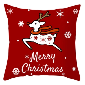 Housse de coussin de Noël rouge avec renne blanc et texte de vœux Merry Christmas