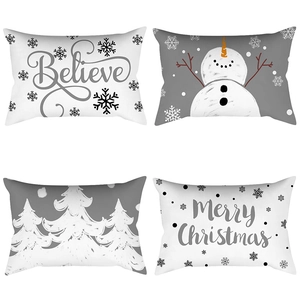 Set of four Christmas lumbar pillow covers with Believe and snowman prints in monochrome