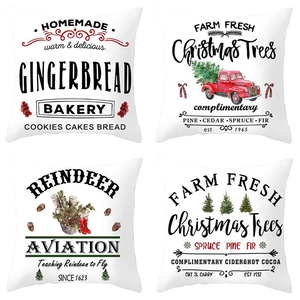 Set of four Christmas peach skin pillow covers with vintage farm and reindeer prints