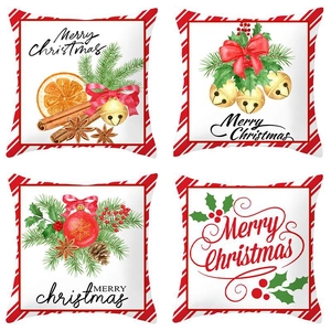 Set of four Christmas peach skin pillow covers with festive pine and berry patterns