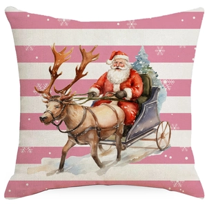 Pink striped Christmas pillow cover featuring Santa Claus and reindeer on white background