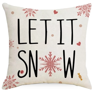 Pink Christmas linen pillowcase with Let It Snow print and red snowflake patterns
