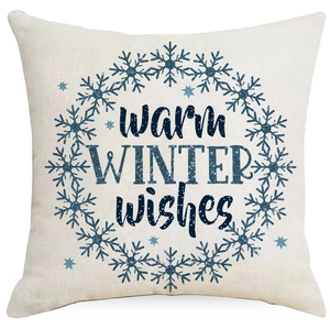 Square blue snowflake linen pillow cover with Warm Winter Wishes text on white background