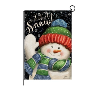Detail of Christmas snowman garden flag on metal stand with Let it Snow lettering