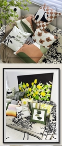 Detail of Nordic green throw pillow covers with modern geometric patterns and quotes