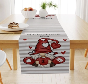 Detail of linen table runner with Valentine's Day gnome print and red heart design