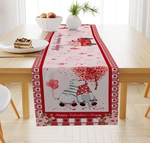 Detail of Valentines Day table runner with cute gnomes, red truck and buffalo plaid pattern