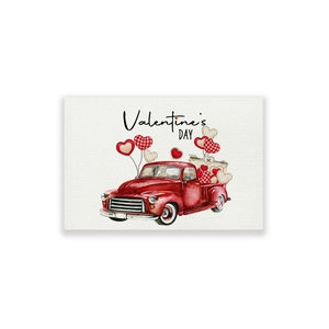 Set de table de la Saint-Valentin avec camion vintage rouge et ballons en forme de coeur