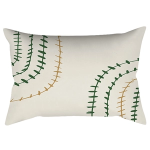 Modern Nordic lumbar pillow featuring green geometric leaf patterns on cream fabric