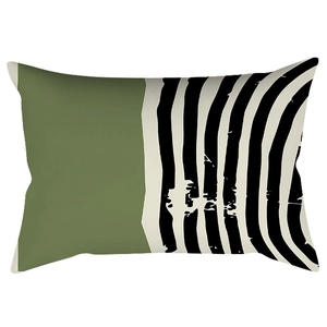 Green and black geometric lumbar pillow cover with modern stripe patchwork design