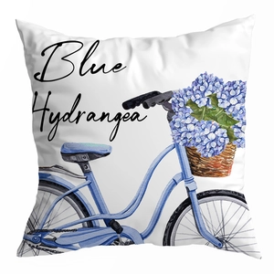 Detail view of peach skin fabric pillowcase featuring watercolor blue hydrangea design