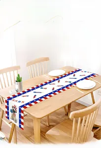 Independence Day table runner with stars, stripes, and pug prints on a wooden table