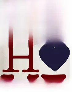 Detail of high-definition digital printing on beige linen pillowcase with red H and blue heart
