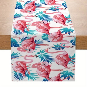 Linen table runner with pink flamingo and tropical palm leaf print for summer dining decor