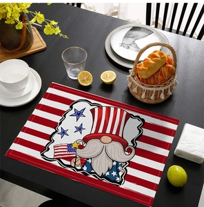 Detail of waterproof Independence Day table mat with gnome and flag on wooden table