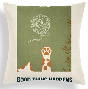 Detailed view of canvas cushion cover with green geometric cat print and lettering