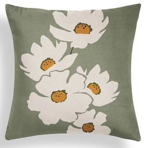 Detail of sage green velvet cushion cover featuring elegant white floral pattern printing