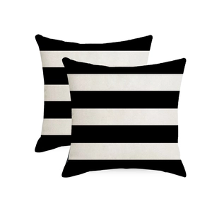 Detail of waterproof linen cushion covers with minimalist black and white geometric stripes