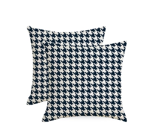 Detail of waterproof linen pillow covers featuring classic black and white houndstooth pattern