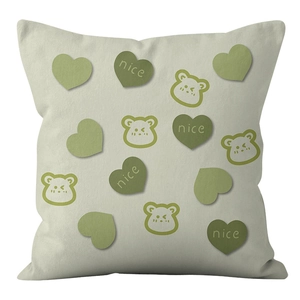 Close-up of soft velvet pillowcase with green heart, bear patterns and nice lettering