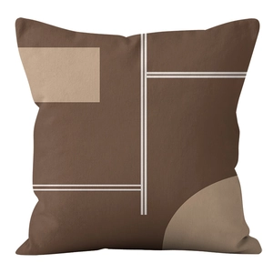 Close-up of brown geometric cushion cover featuring beige abstract shapes and white lines