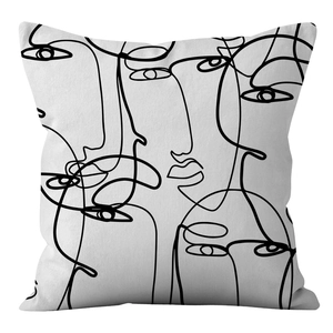 Detailed view of Nordic black and white abstract face line art on a minimalist pillowcase