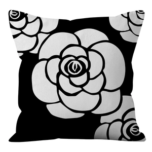 Close-up of black and white camellia flower pattern on luxury square cushion cover