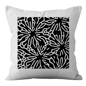 Detail of Nordic minimalist pillow case showing abstract black geometric pattern on white fabric