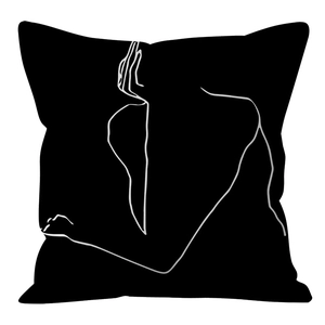 Close-up of black cushion cover featuring white minimalist linear body art outline