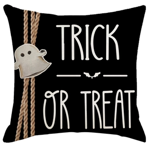 Black linen Halloween pillow cover with ghost design and Trick or Treat typography