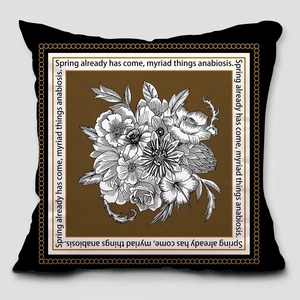 Detail of vintage floral print with English poem on a black decorative throw pillow case