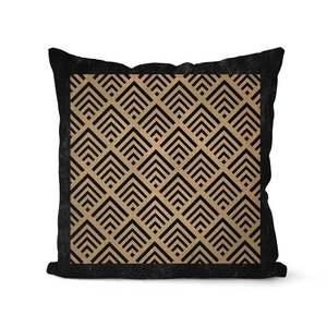 Detail of American retro cushion cover with golden geometric pattern on black velvet