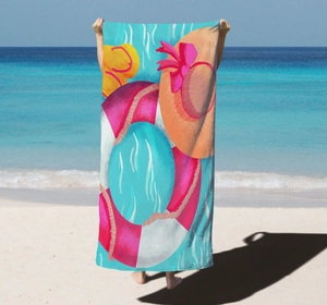 Detailed macro view of microfiber beach towel with summer icons like hats and flip-flops