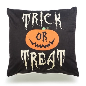 Halloween Trick or Treat pillow cover with orange pumpkin design on black linen fabric