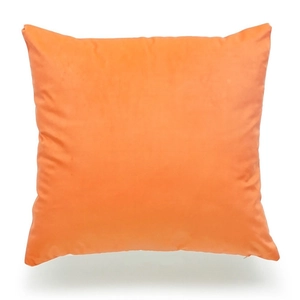 Detailed close-up showing the fine brushed texture and fabric of the orange linen pillow cover