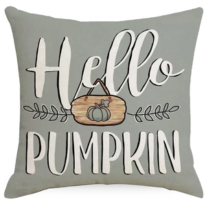 Detailed fabric texture of a sage green Thanksgiving pillowcase with Hello Pumpkin print