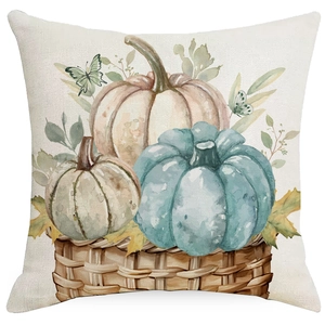 Detail of linen pillowcase with watercolor pumpkins and leaves for autumn home decoration
