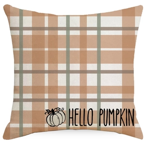 Detail of linen pillow cover with orange plaid pattern and Hello Pumpkin autumn design