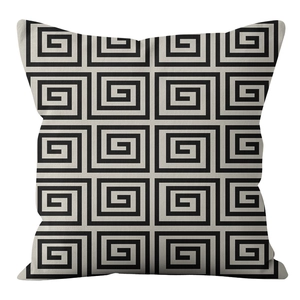 Brown Nordic geometric pillow cover with classic black and white Greek Key pattern
