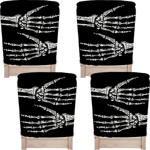 Set of four black cotton linen Halloween chair covers with white skeletal hand prints