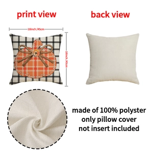 Detail of pumpkin patch embroidery and wood button on plaid autumn throw pillow cover