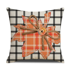 Plaid buffalo check pillow cover with orange maple leaf and rustic button decoration