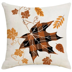 Detailed macro view of linen pillowcase texture with orange buffalo plaid maple leaf design