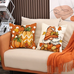 Detailed texture of autumn throw pillow covers featuring pumpkins and gnomes on sofa