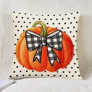 Halloween decorative pillow case with watercolor pumpkin and checkered bow on polka dot background