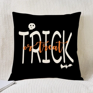 Halloween throw pillow cover featuring white Trick or Treat text on black background