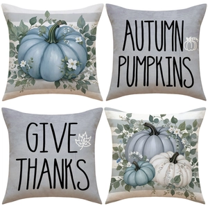 Set of four autumn pumpkin pillow covers in blue and white linen for home decoration